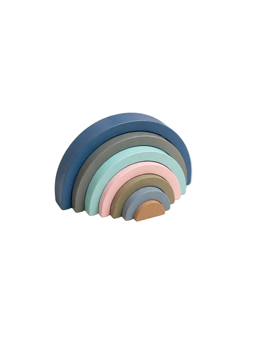 A pastel rainbow wooden toy with seven nested semi-circles in shades of blue, gray, mint, pink, sage, dusty blue, and tan, displayed on a light marble surface against a warm cream background.